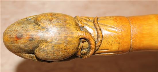 A Japanese carved bamboo walking stick, 36in.